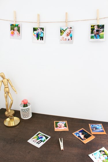 DIY Metal Polaroids hung with clothespins