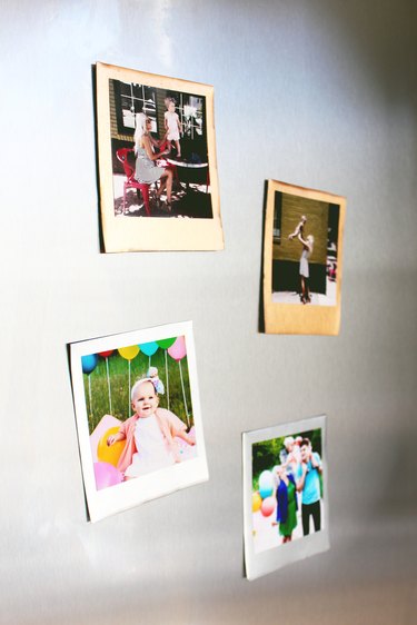 Photos on a fridge.