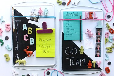 cookie sheet memo board decorated with magnets and a chalkboard