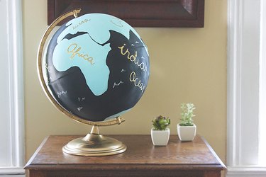painted globe on an end table