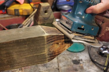 Use an electric sander to smooth out the rough edges of the wood