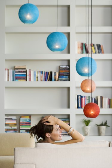 Woman relaxing in modern living space