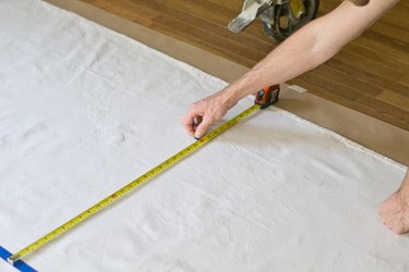 Measure the center of each row to place the stencil.