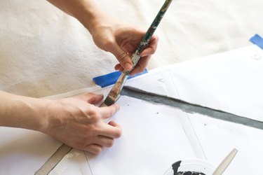 Paint the drop cloth following the template.