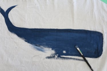 Paint whale with blue paint, leaving a portion of the bottom unpainted.